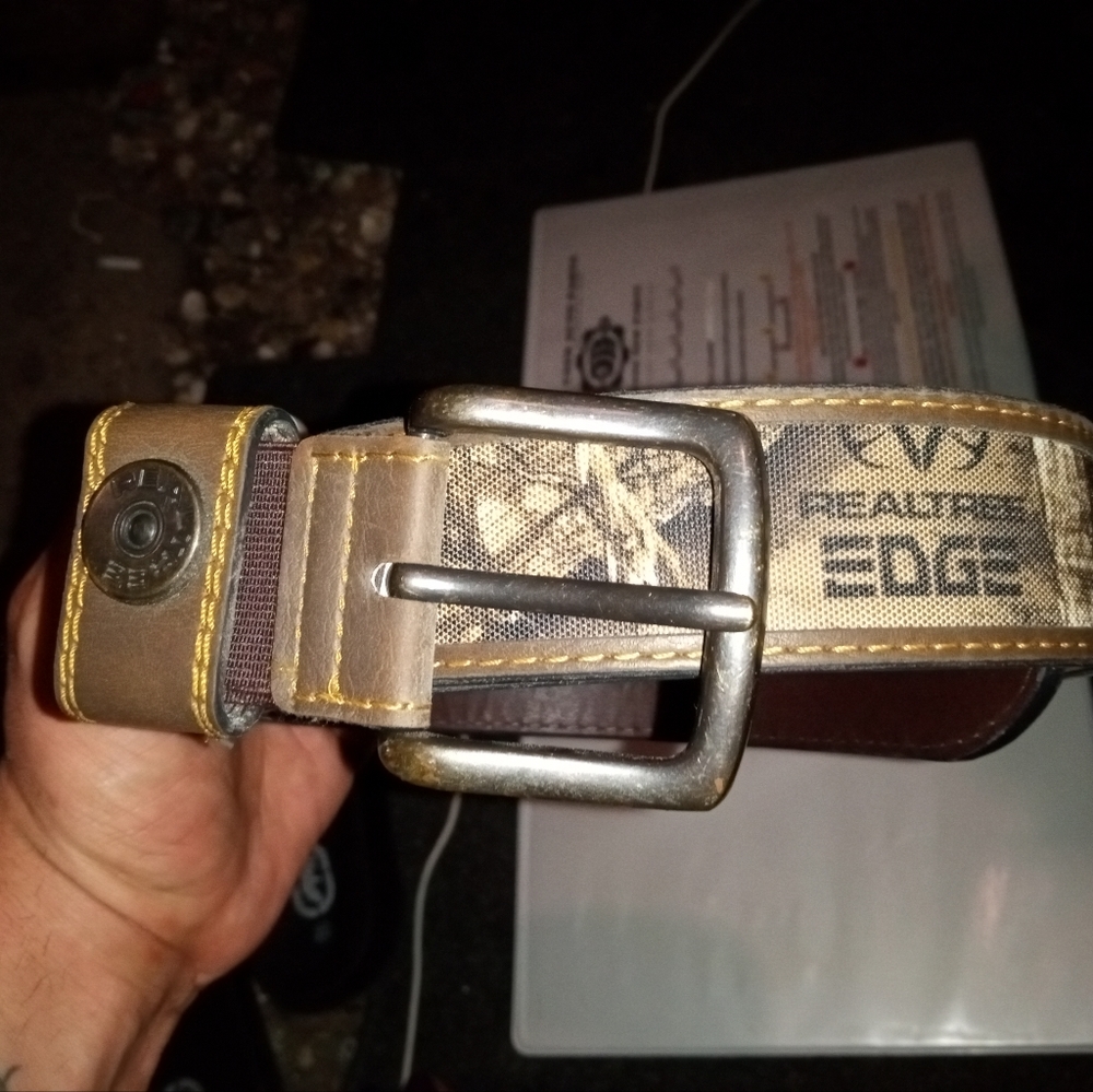 Real Tree leather and camoflaged belt.
